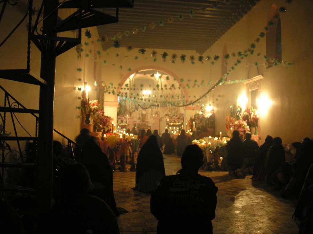 Community members praying in the chapel
